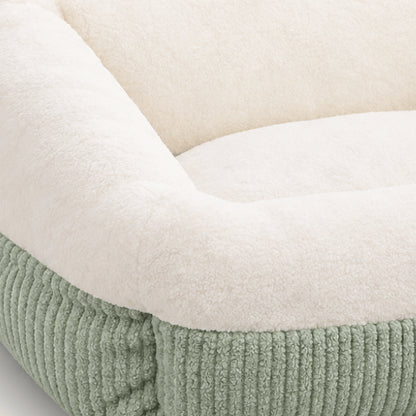 Couchage chaton en fourrure épaisse avec extérieur vert en velours côtelé