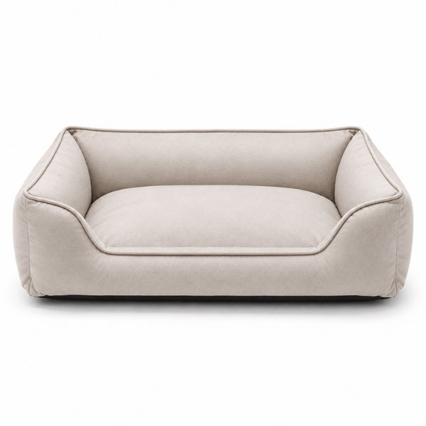 Lit pour chat beige rectangulaire avec bords rembourrés et entrée basse
