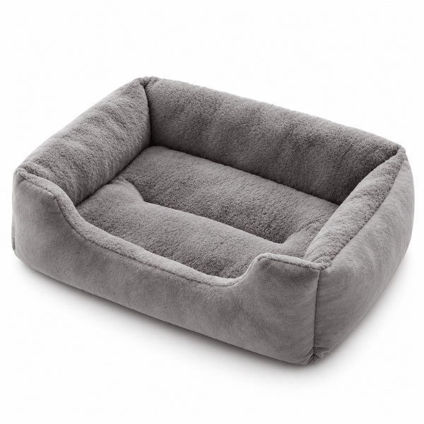 Lit chat rectangulaire gris vu en perspective avec structure rembourrée stable