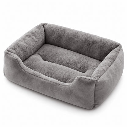 Lit chat rectangulaire gris vu en perspective avec structure rembourrée stable