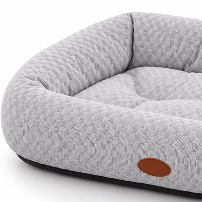 Lit rafraîchissant pour chat gris montrant le tissu texturé doux et respirant